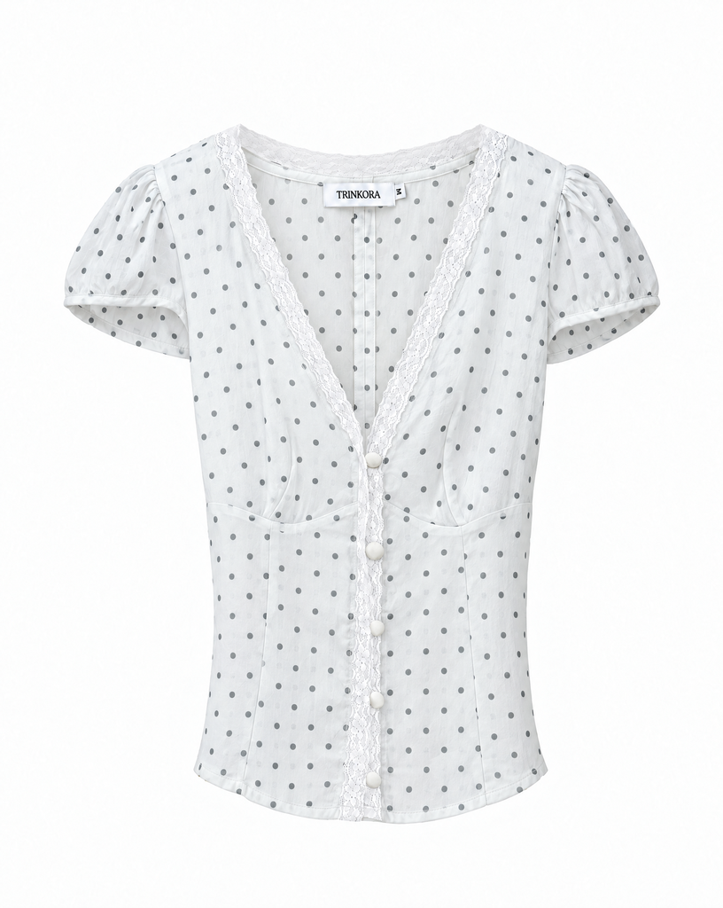 Generated with Kive.ai - Change only the fabric appearance of the blouse in Image 1 to match the fabric in Image 2 white fabric with evenly scattered small gray polka dots and a light_ slightly sheer woven appearance. App.webp
